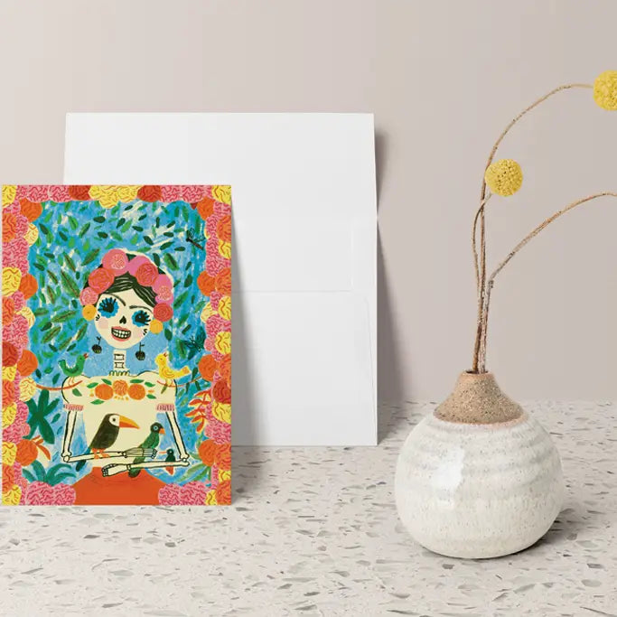 Tarjeta Día de Muertos Frida en su jardín